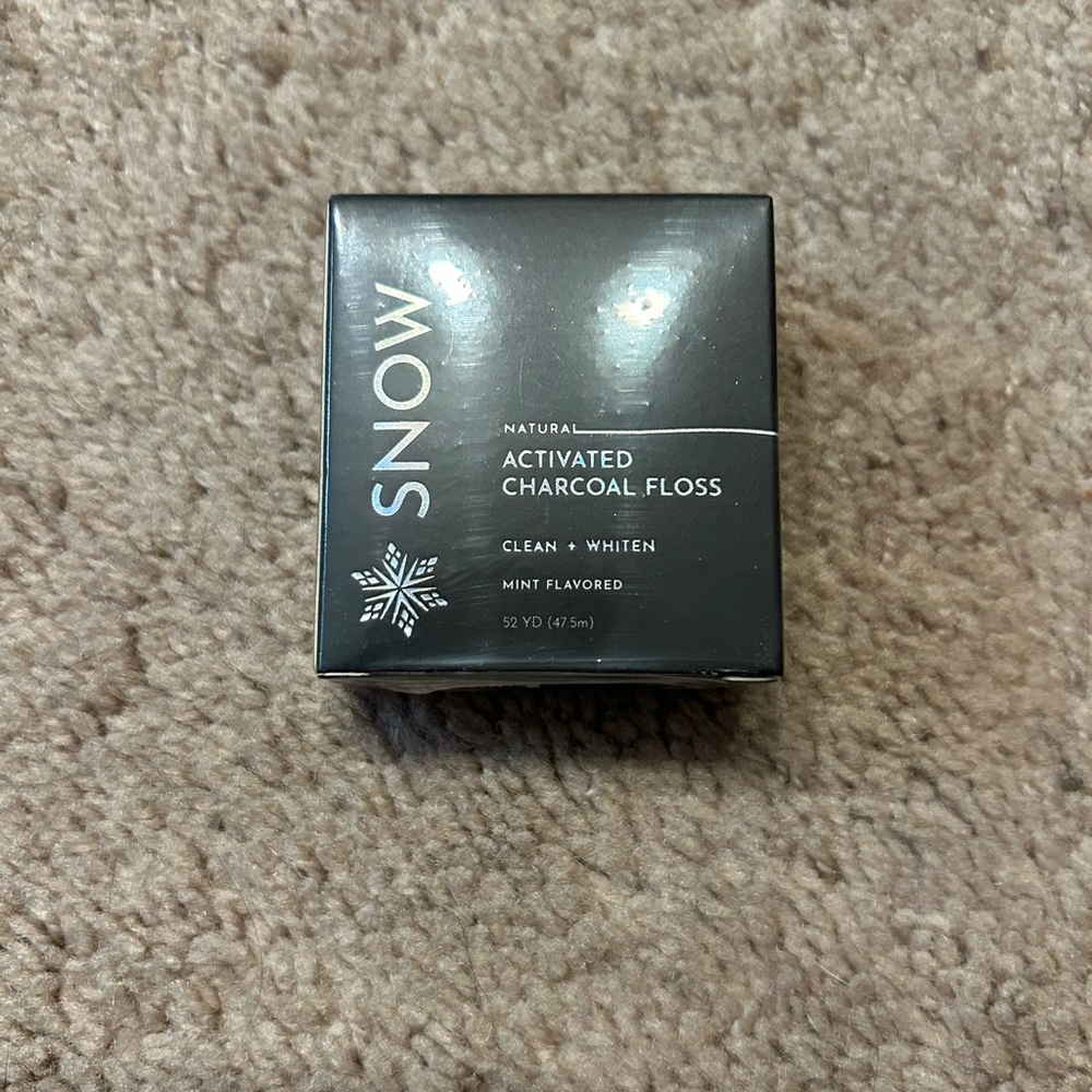Snow natural activated charcoal floss